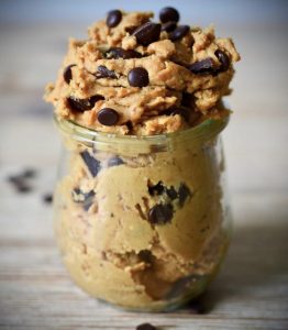 Tasty-looking vegan chickpea cookie dough in a small glass dish