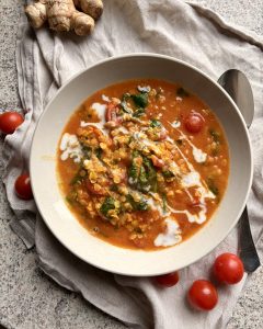 red lentil and spinach dal on a plate